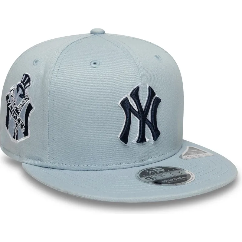 cappello-piatto-blu-snapback-con-logo-blu-marino-9fifty-original-fit-world-series-dei-new-york-yankees-mlb-di-new-era