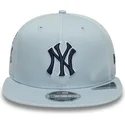 cappello-piatto-blu-snapback-con-logo-blu-navy-9fifty-original-fit-world-series-dei-new-york-yankees-mlb-di-new-era