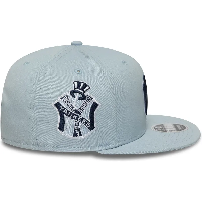 cappello-piatto-blu-snapback-con-logo-blu-marino-9fifty-original-fit-world-series-dei-new-york-yankees-mlb-di-new-era
