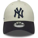 cappellino-curvo-beige-e-blu-navy-regolabile-9forty-side-script-dei-new-york-yankees-mlb-di-new-era