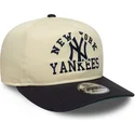 cappellino-curvo-beige-e-blu-marino-snapback-19twenty-heritage-di-new-york-yankees-mlb-di-new-era