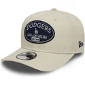cappellino-beige-snapback-curvo-9seventy-stretch-snap-patch-dei-los-angeles-dodgers-mlb-di-new-era