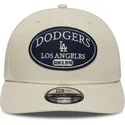 cappellino-beige-snapback-curvo-9seventy-stretch-snap-patch-dei-los-angeles-dodgers-mlb-di-new-era