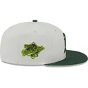 cappello-piatto-beige-e-verde-aderente-59fifty-clr-dvlp-di-oakland-athletics-mlb-di-new-era