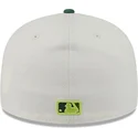 cappello-piatto-beige-e-verde-aderente-59fifty-clr-dvlp-di-oakland-athletics-mlb-di-new-era