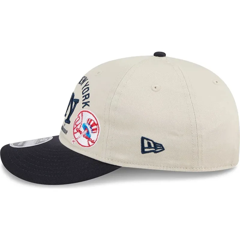 beige-und-marineblaue-gebogene-snapback-kappe-9fifty-retro-crown-scatter-der-new-york-yankees-mlb-von-new-era