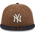 new-york-yankees-mlb-new-era-9fifty-retro-crown-uld-pinstripe-brun-og-marinebla-justerbar-flad-kasket