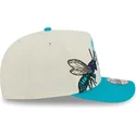 casquette-courbee-beige-et-bleue-snapback-9fifty-a-frame-precurved-hardwood-classics-charlotte-hornets-nba-new-era
