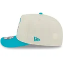 cappello-snapback-beige-e-blu-curva-9fifty-a-frame-precurved-hardwood-classics-dei-charlotte-hornets-nba-di-new-era