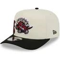 cappellino-visiera-curva-beige-e-nero-snapback-9fifty-a-frame-precurved-hardwood-classics-di-toronto-raptors-nba-di-new-era