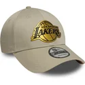 cappellino-curvo-beige-snapback-9forty-metallic-dei-los-angeles-lakers-nba-di-new-era
