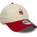 buet-beige-og-rod-justerbar-kasket-9twenty-mini-washed-fra-new-york-yankees-mlb-fra-new-era