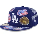plaska-czapka-niebieska-dopasowana-59fifty-all-over-logos-los-angeles-dodgers-mlb-new-era