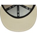 gorra-plana-beige-ajustada-con-logo-azul-marino-59fifty-city-icon-de-new-york-yankees-de-new-era