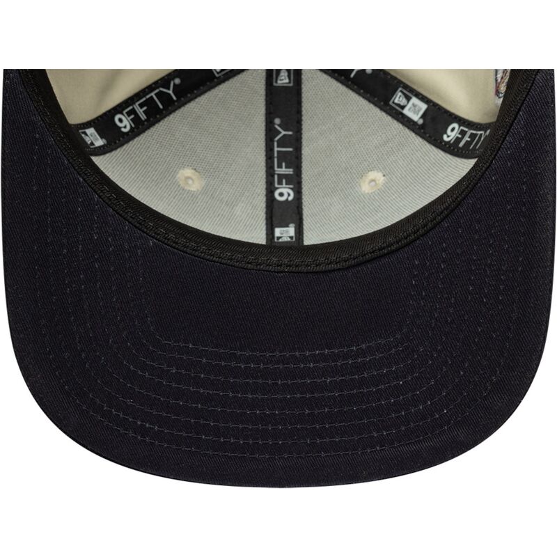 cappello-piatto-beige-snapback-con-logo-blu-marino-9fifty-original-fit-world-series-dei-new-york-yankees-mlb-di-new-era