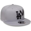 casquette-plate-grise-snapback-avec-logo-noir-9fifty-outdoor-icon-los-angeles-dodgers-mlb-new-era
